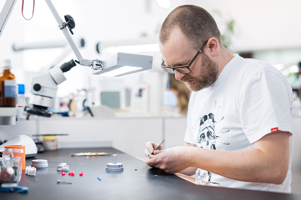Master Dental Technician Stephan Juckel producing a wax model