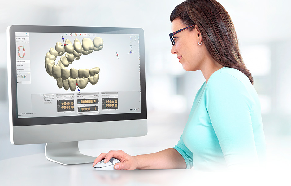 Die Zahntechnikerin erstellt die Prothese im CAD System, auf dem Bildschirm wird die Position eines Zahns angepasst Die Zahntechnikerin erstellt die Prothese im CAD System, auf dem Bildschirm wird die Position eines Zahns angepasst